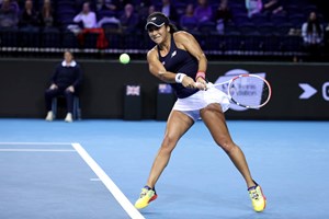 Heather Watson returning a backhand during her singles rubber against Storm Sanders in the semi-finals of the Billie Jean King Cup 2022
