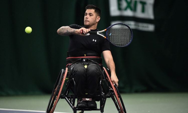 Gary Cox plays a shot to Tony Heslop in the mens singles match during the LTA Wheelchair National Finals at The Shrewsbury Club on November 27, 2021 in Shrewsbury, England.