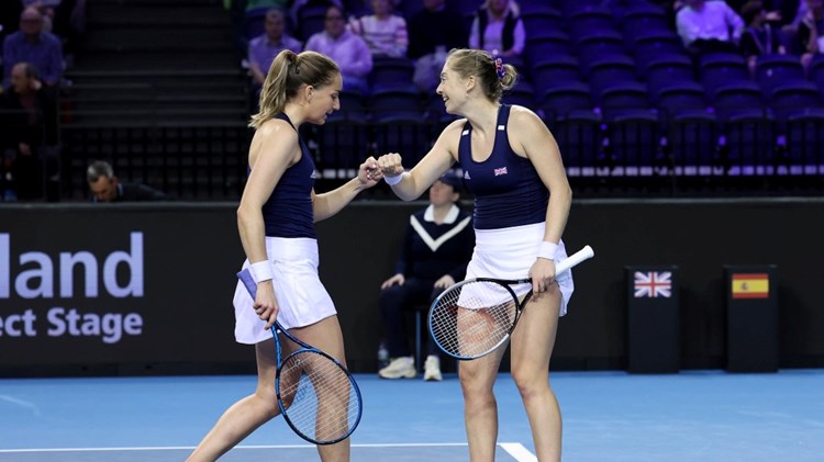 Olivia Nicholls and Alicia Barnett fist bump against Spain at the Billie Jean King Cup