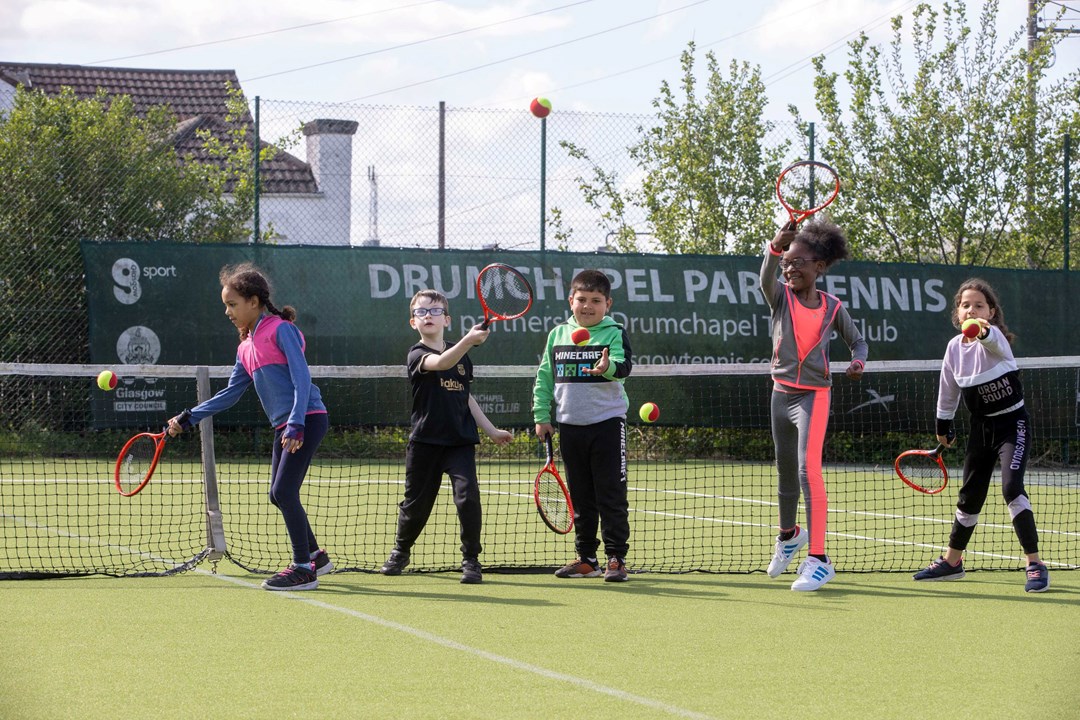 Children playing tennis