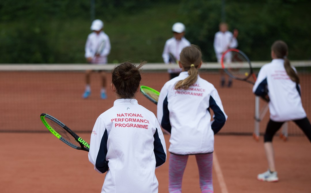 youth tennis lesson taking place at the national performance programme