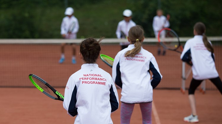 youth tennis lesson taking place at the national performance programme