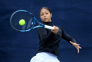 Sarah returning a serve mid game