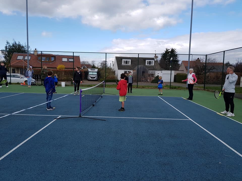 Judy Murray delivering a parent-child session alongside Mel Benson and club coach, Euan Cameron. 