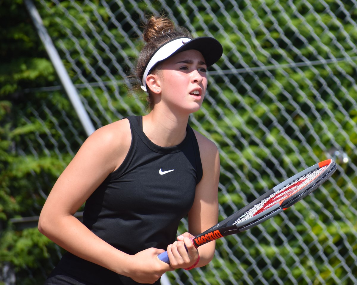 Gracey Hurley concentrating on the returning ball during a game