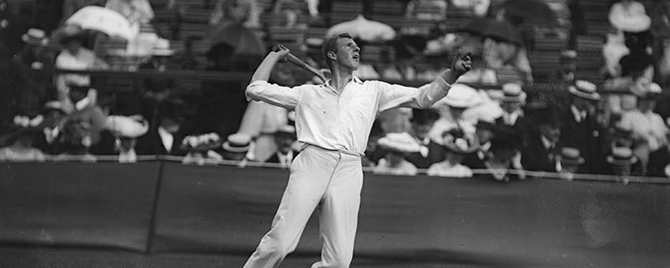 black and white image of anthony wilding serving