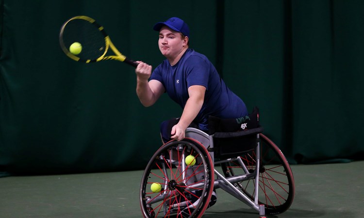 Andrew Penney returning a backhand during the men's wheelchair singles final at the 2022 LTA Wheelchair Tennis National Finals