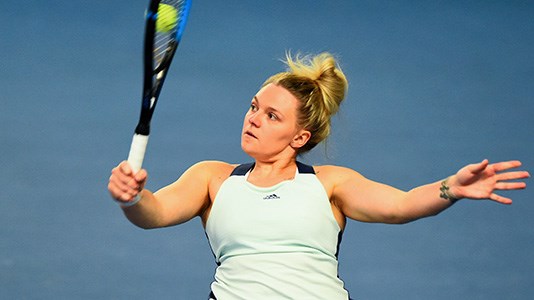 Jordanne Whiley hits a backhand 