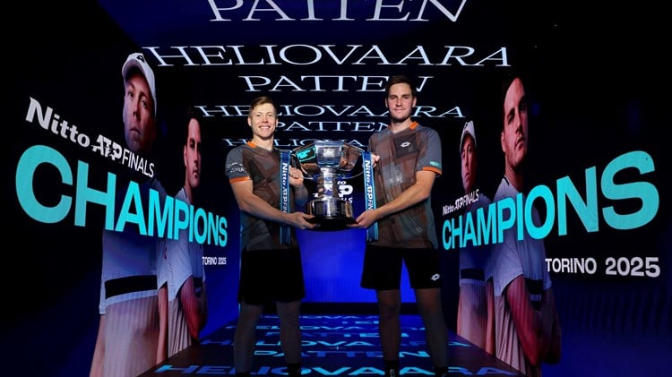 Harri Heliovaara and Henry Patten holding the 2025 Nitto ATP Finals doubles title