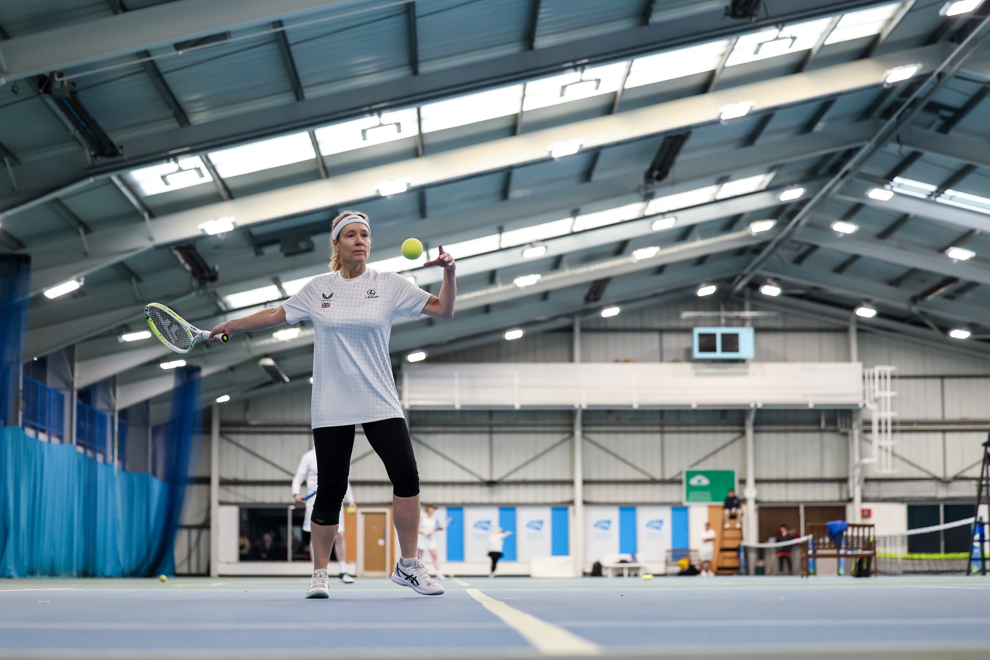 Player hitting a forehand at the Visually Impaired Tennis National Championships