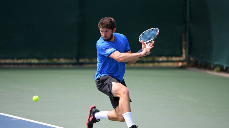 Sean Hodkin hits a backhand slice at the 2020 British Tour