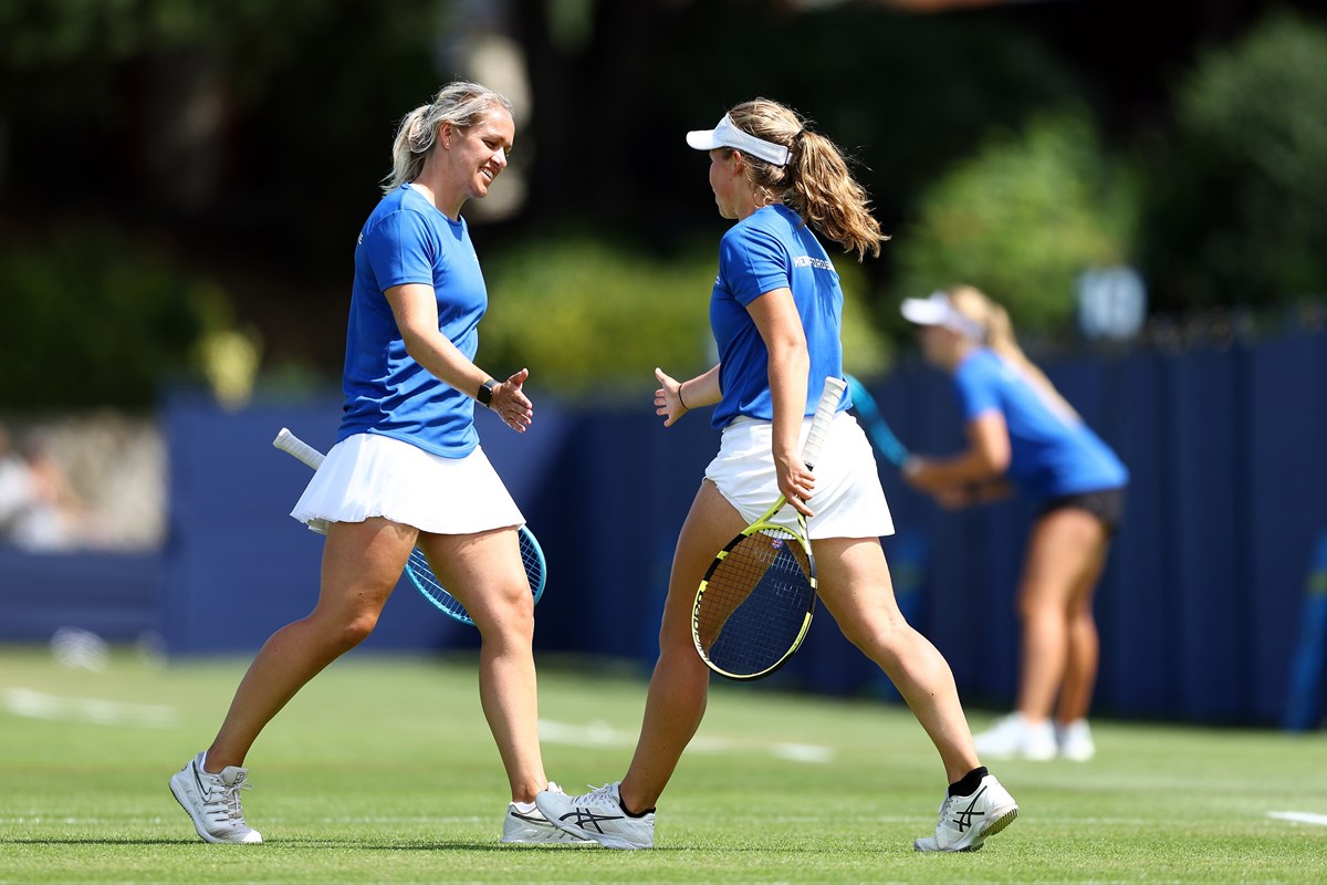 Two female players about to shake hands.JPG