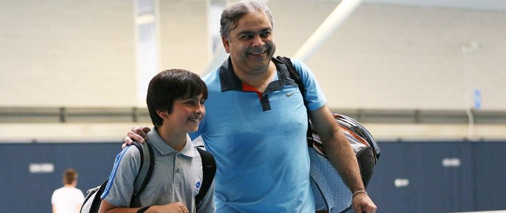Father and Son at tennis courts