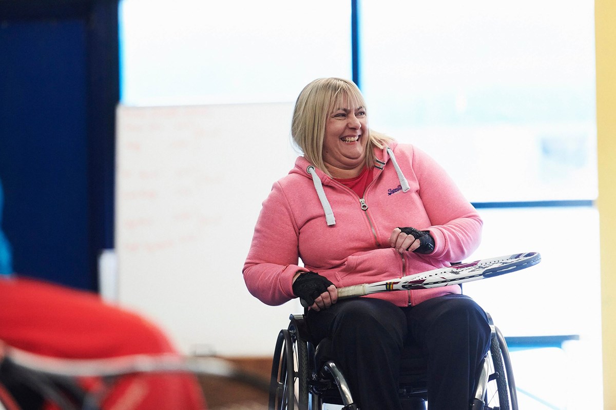 Laughing woman in wheelchair.jpg