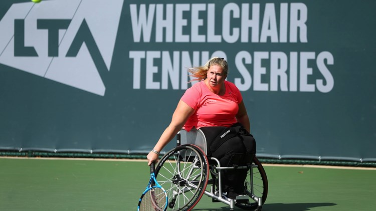 Louise Hunt Skelley plays a backhand during her match against Jordanne Whiley during the 2020 LTA Wheelchair Tennis Tournament at the National Tennis Centre