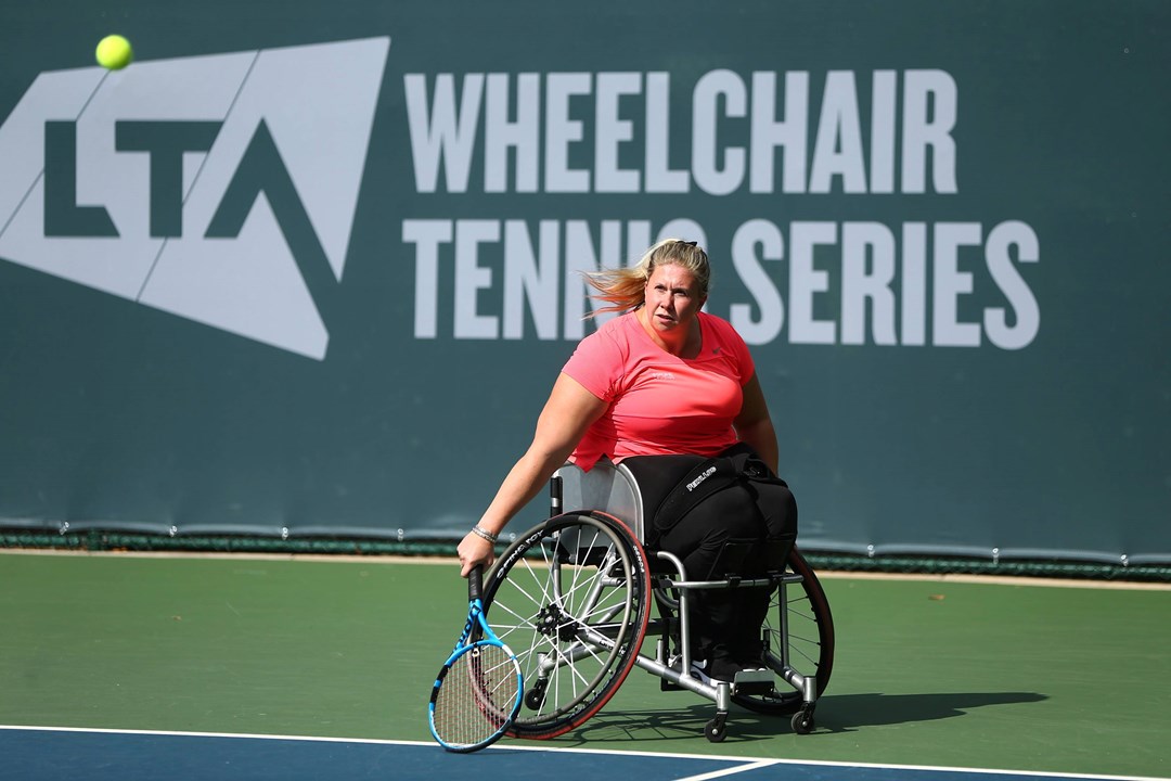 Louise Hunt Skelley plays a backhand during her match against Jordanne Whiley during the 2020 LTA Wheelchair Tennis Tournament at the National Tennis Centre