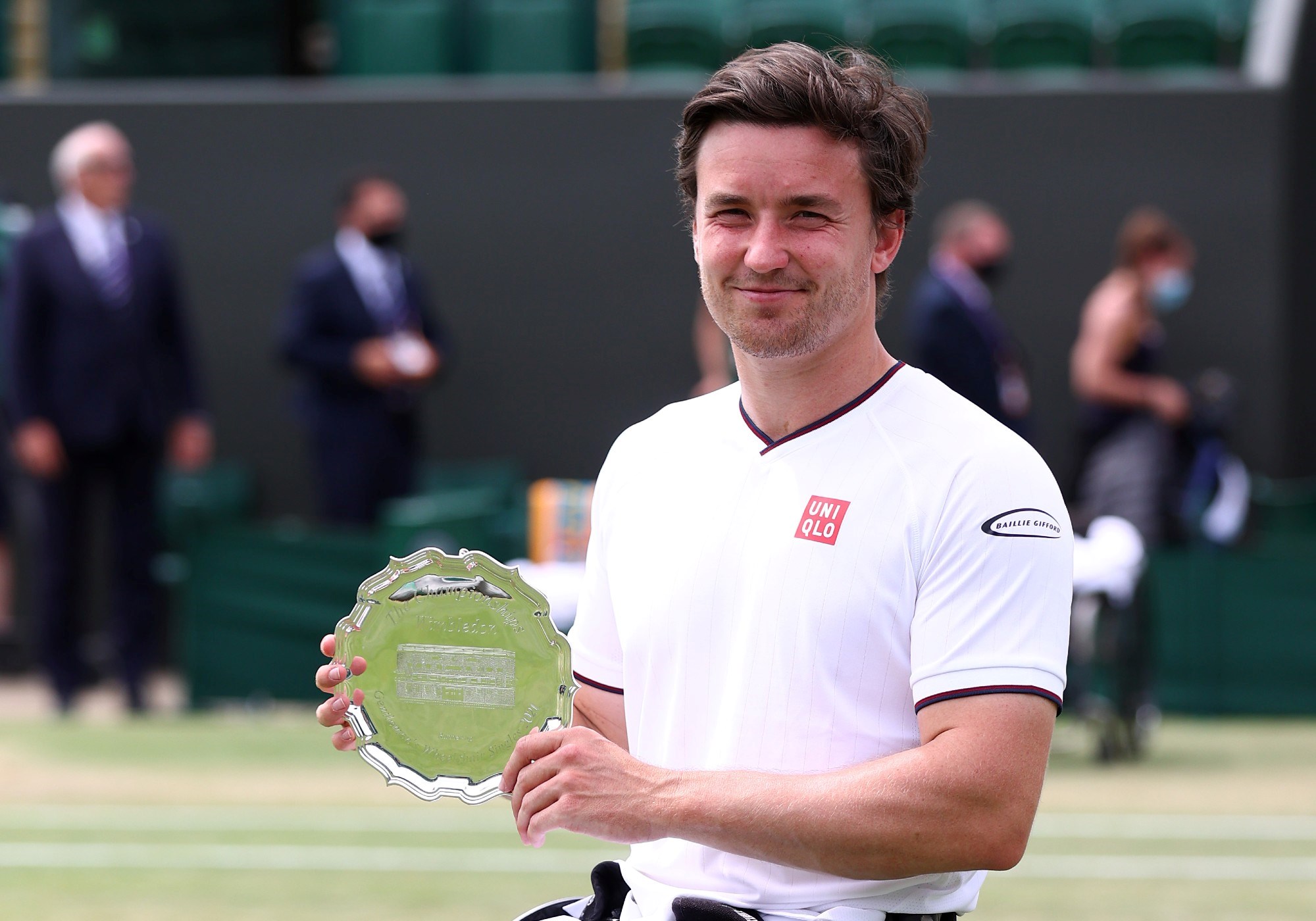 Gordon Reid of Great Britain poses with the runner up trophy after his men's wheelchair singles final match against Joachim Gerard of Belgium during Day Thirteen of The Championships - Wimbledon 2021