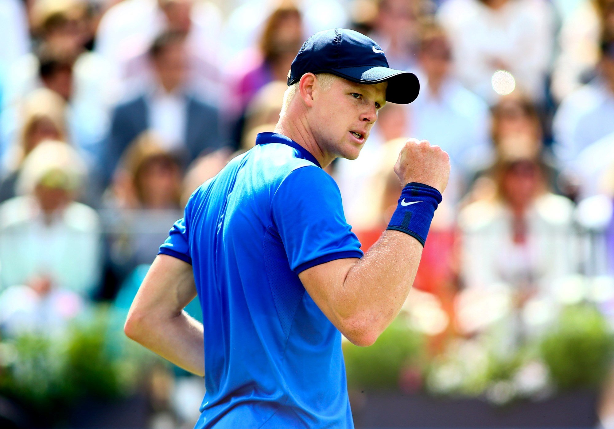 Kyle Edmund of Great Britain celebrates a game point 