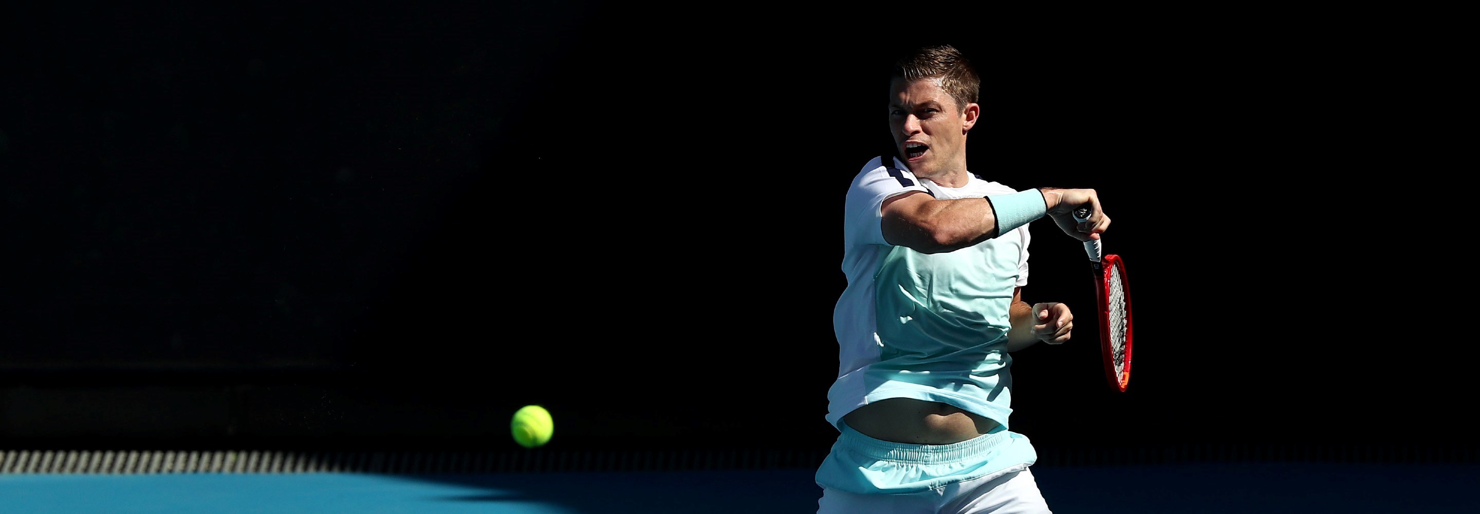 Neal Skupski of Great Britain plays a forehand