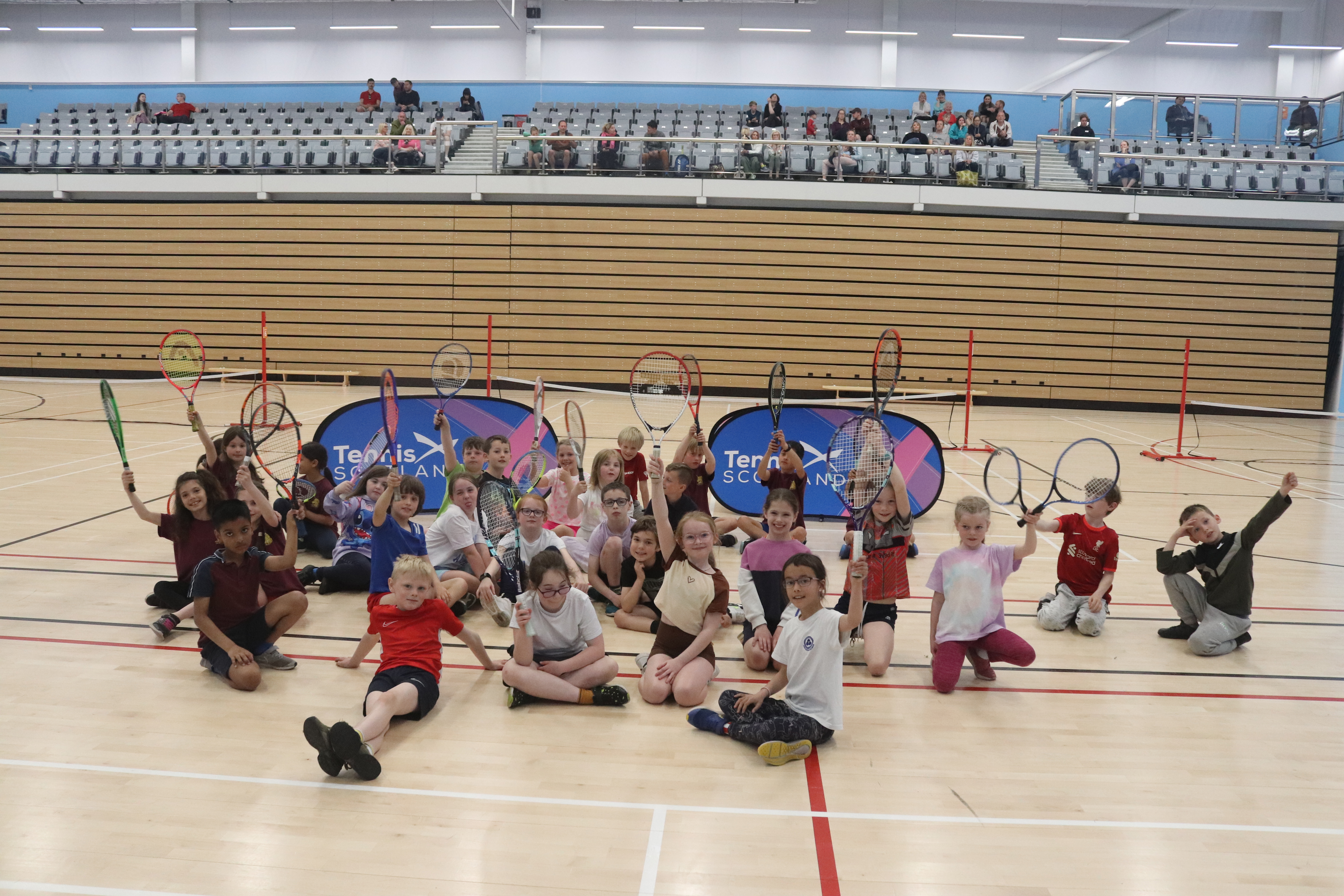 Schoolchildren compete in 'Tag Team' tennis tournament