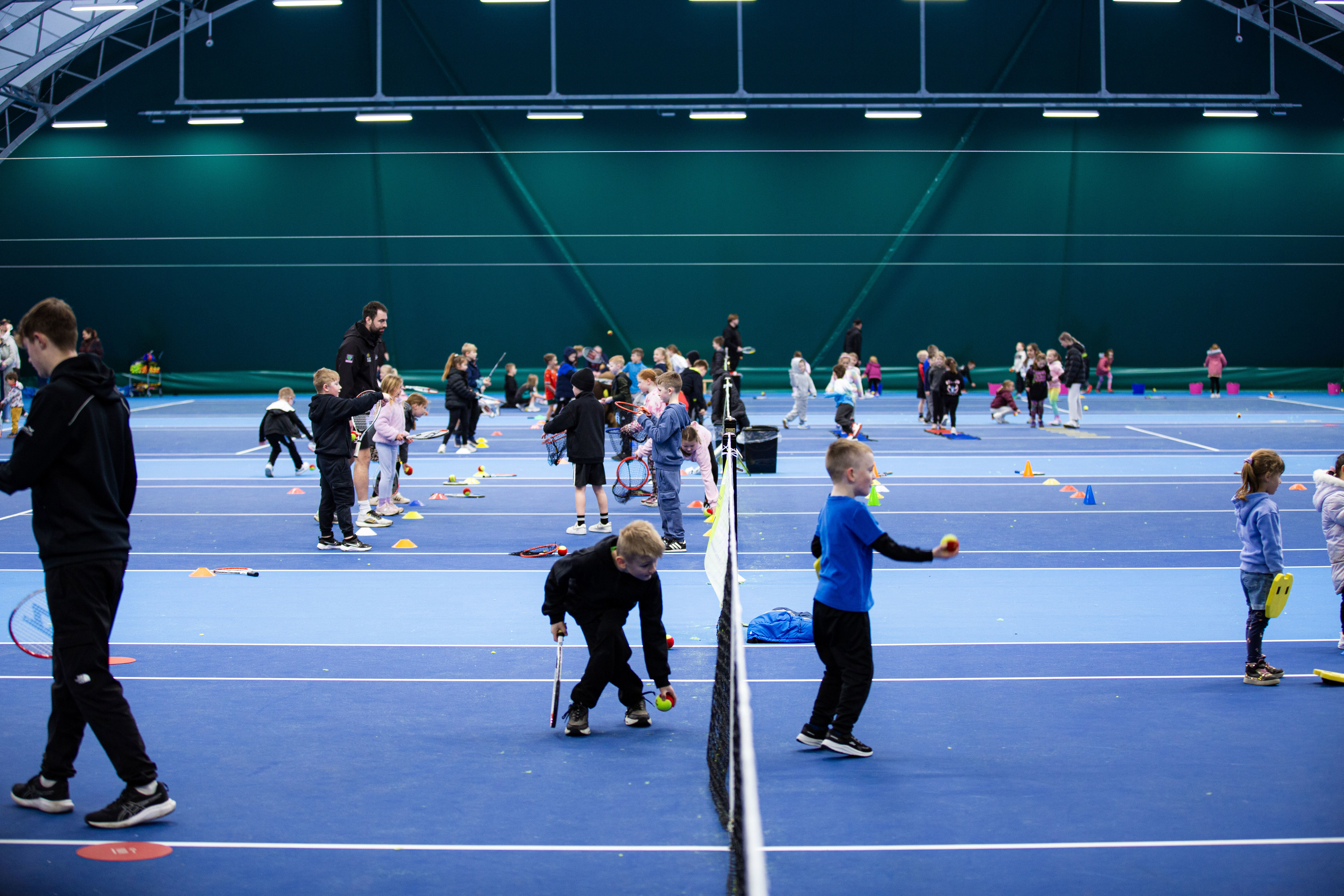 Hundreds of children enjoy tennis during schools roadshow visit to Moray