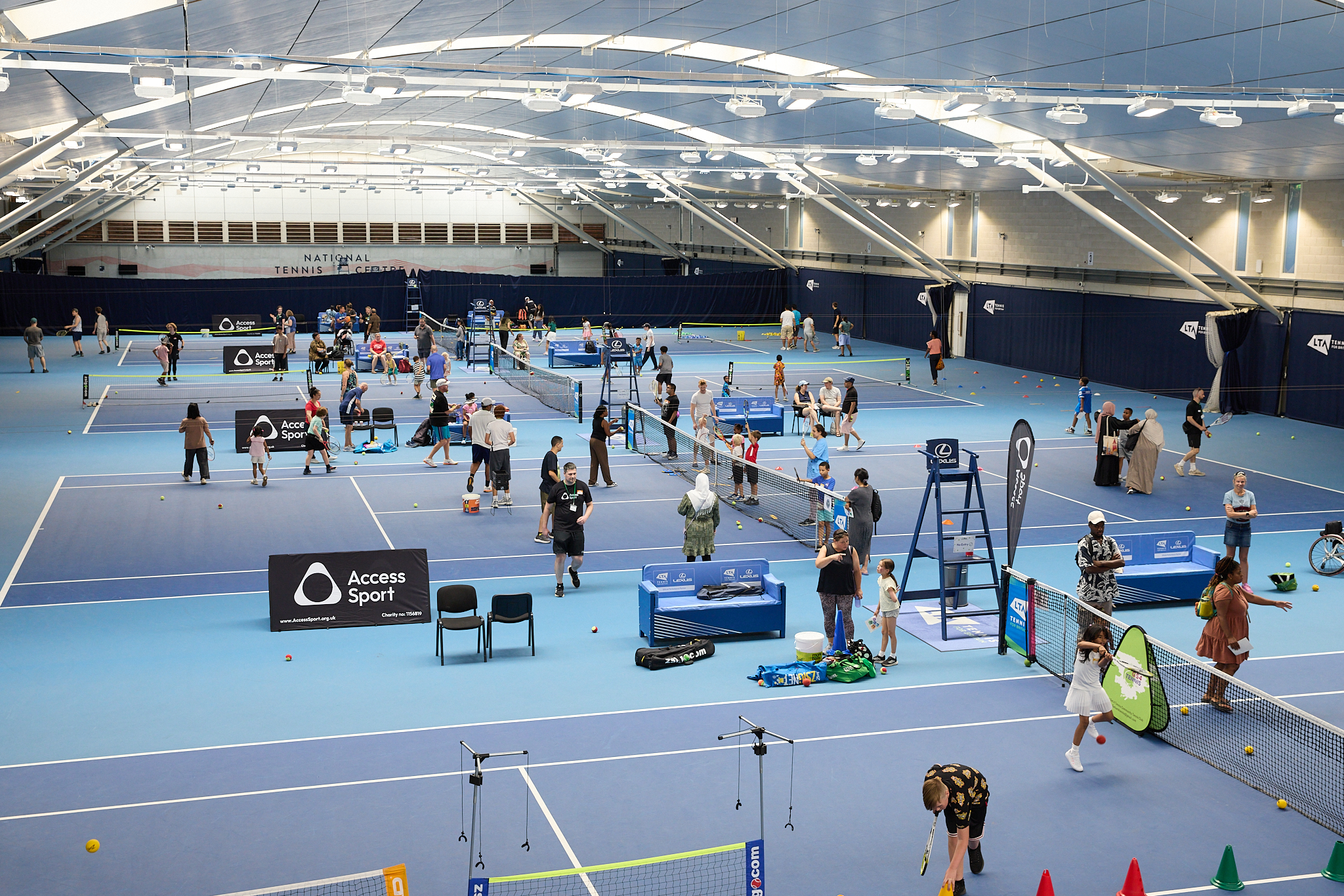 An indoor tennis festival in action