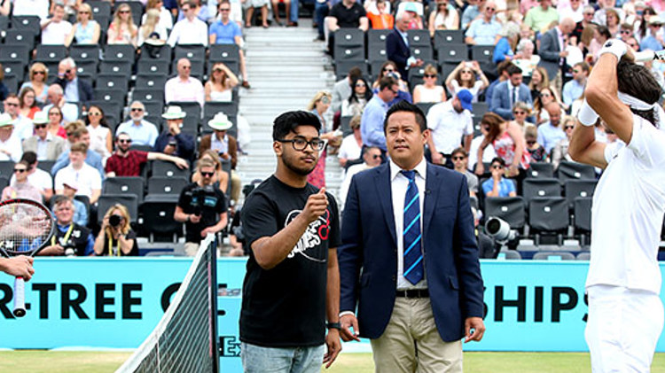 Feliciano Lopez and Giles Simon with StreetGames performing a coin toss at the 2019 Queen's Championships