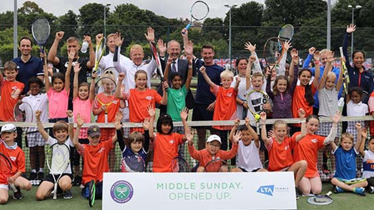 Adults and children celebrating the first ‘Middle Sunday Opened Up’ free tennis festival