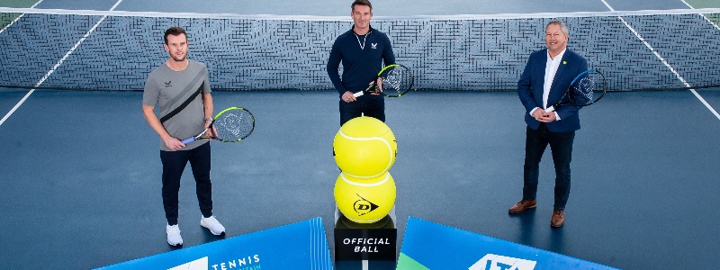 Leon Smith, Scott Lloyd and Steve Heatley holding tennis rackets on a court