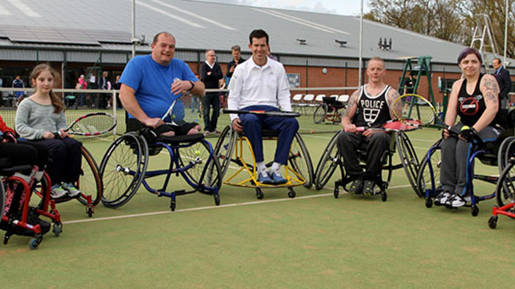 Group of wheelchair tennis players on a tennis court