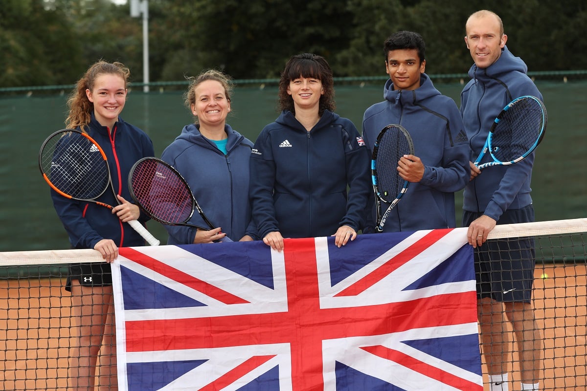 Team GB stood behind union jack flag
