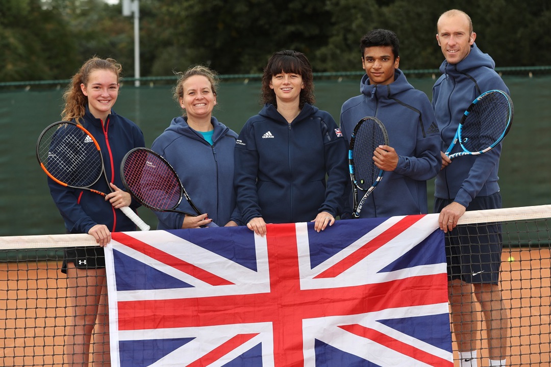 Team GB stood behind union jack flag
