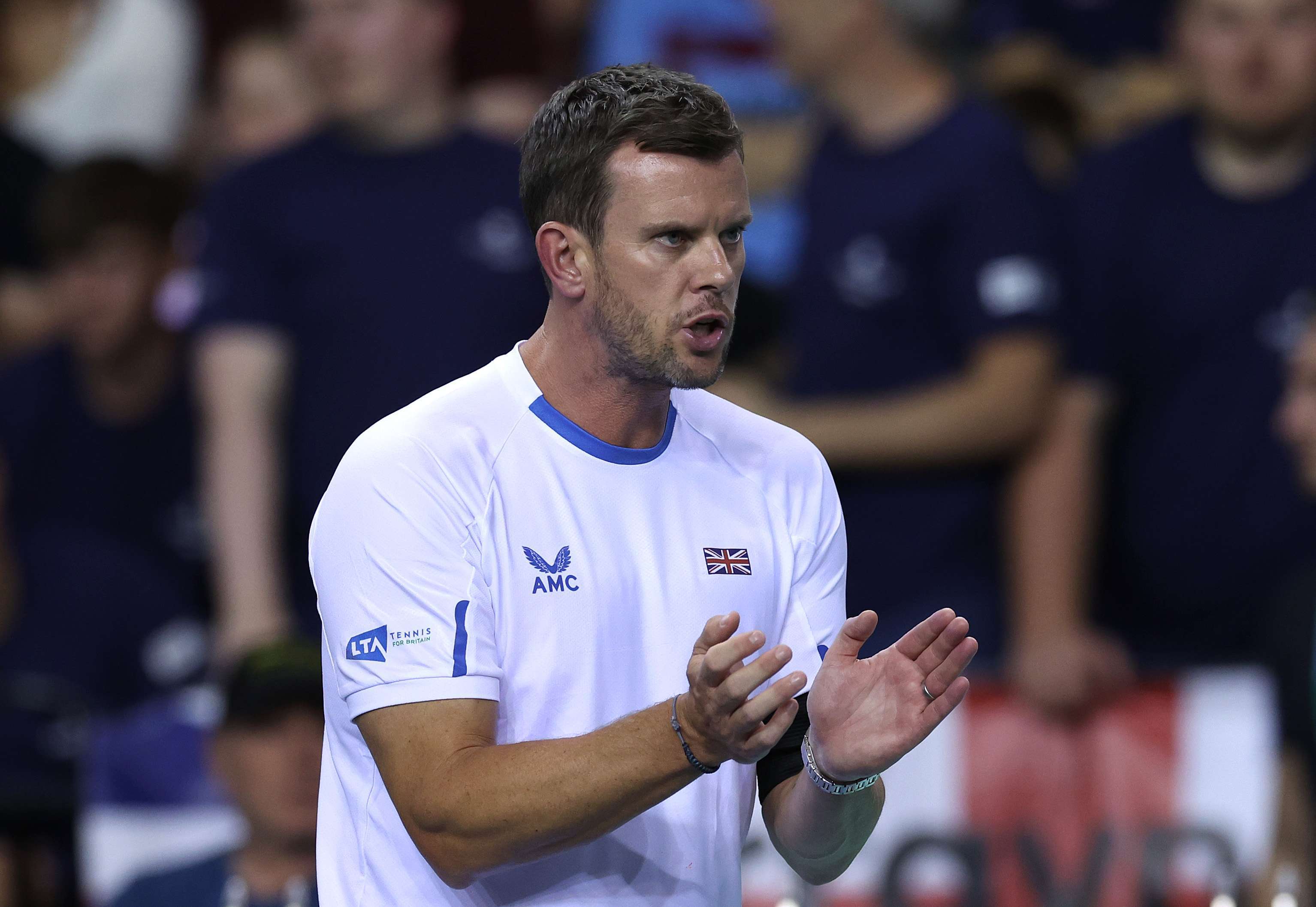 Leon Smith clapping at the Davis Cup Finals in 2022