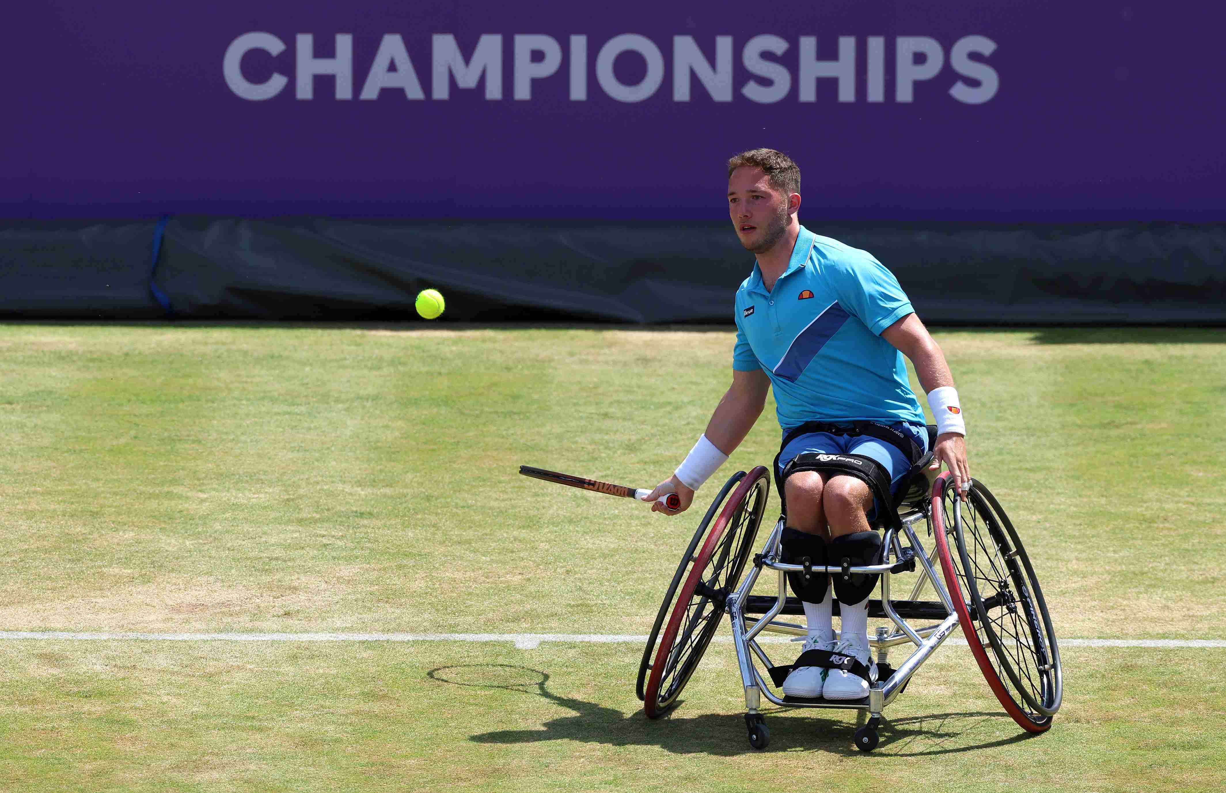 British wheelchair player Alfie Hewett hits a forehand on court at the cinch Championships