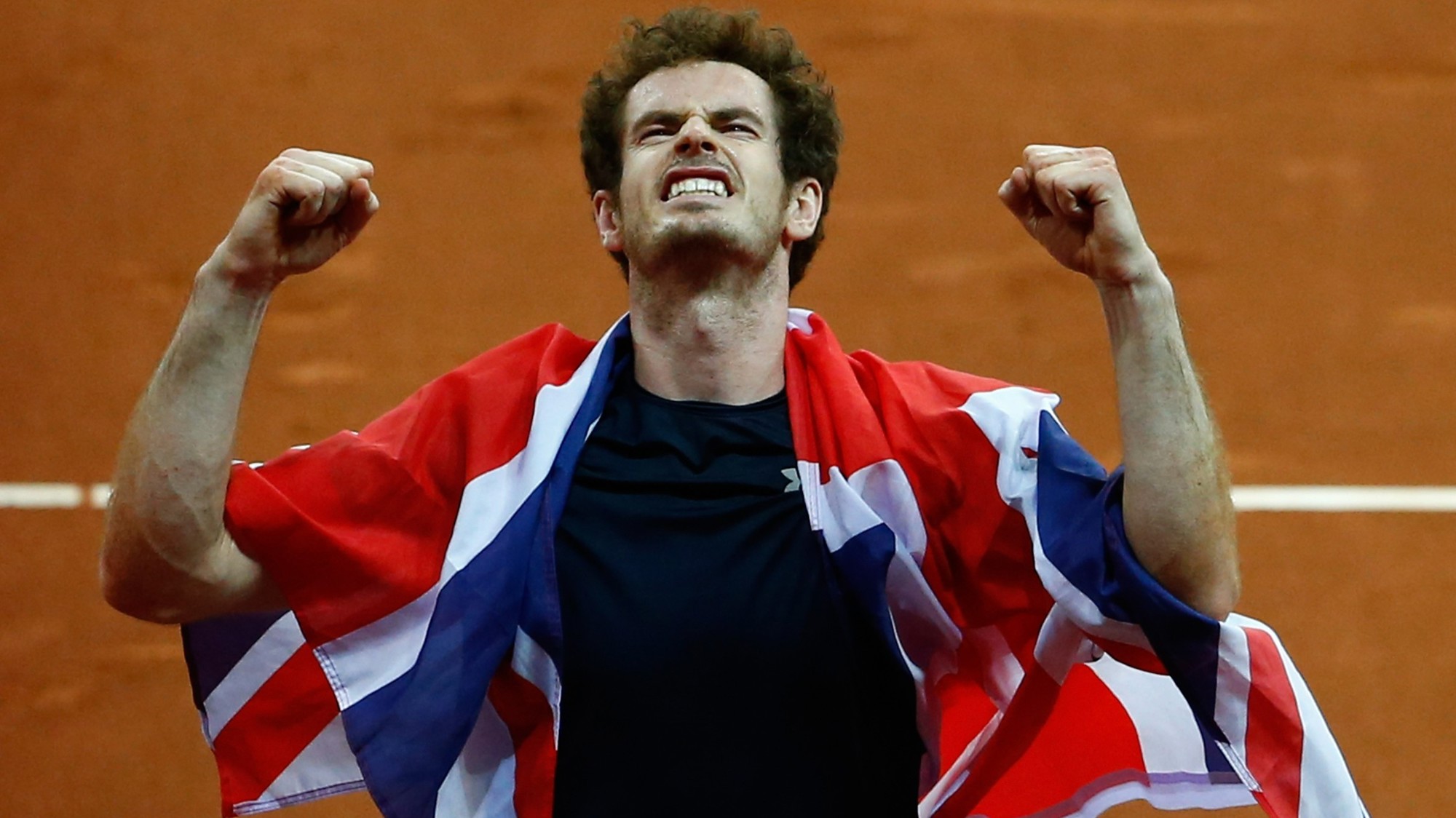 Andy Murray of Great Britain celebrates winning his singles match against David Goffin of Belgium and clinching the Davis Cup
