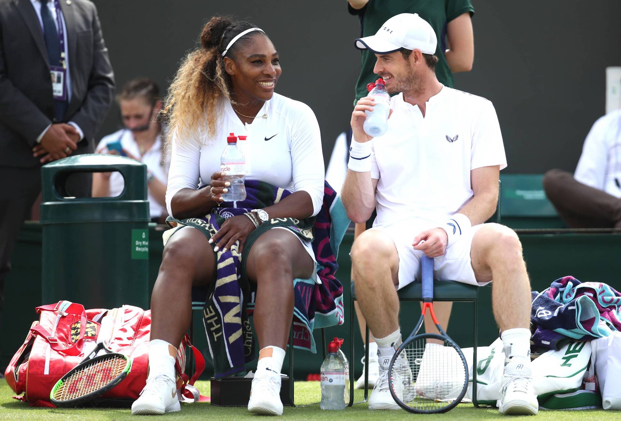 Serena Williams and Andy Murray chatting on court during the third round of the mixed doubles at Wimbledon in 2019