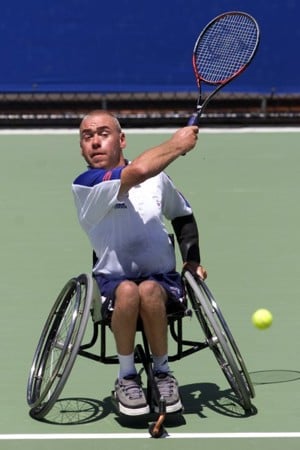 Simon Hatt hitting a forehand in a match