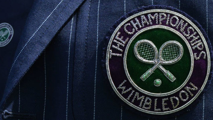 zoomed in image of wimbledon the championships logo on Mike Ross wimbledon suit