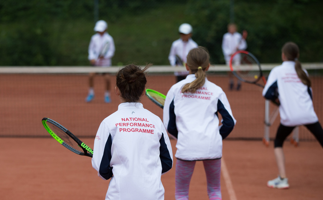 youth tennis lesson taking place at the national performance programme
