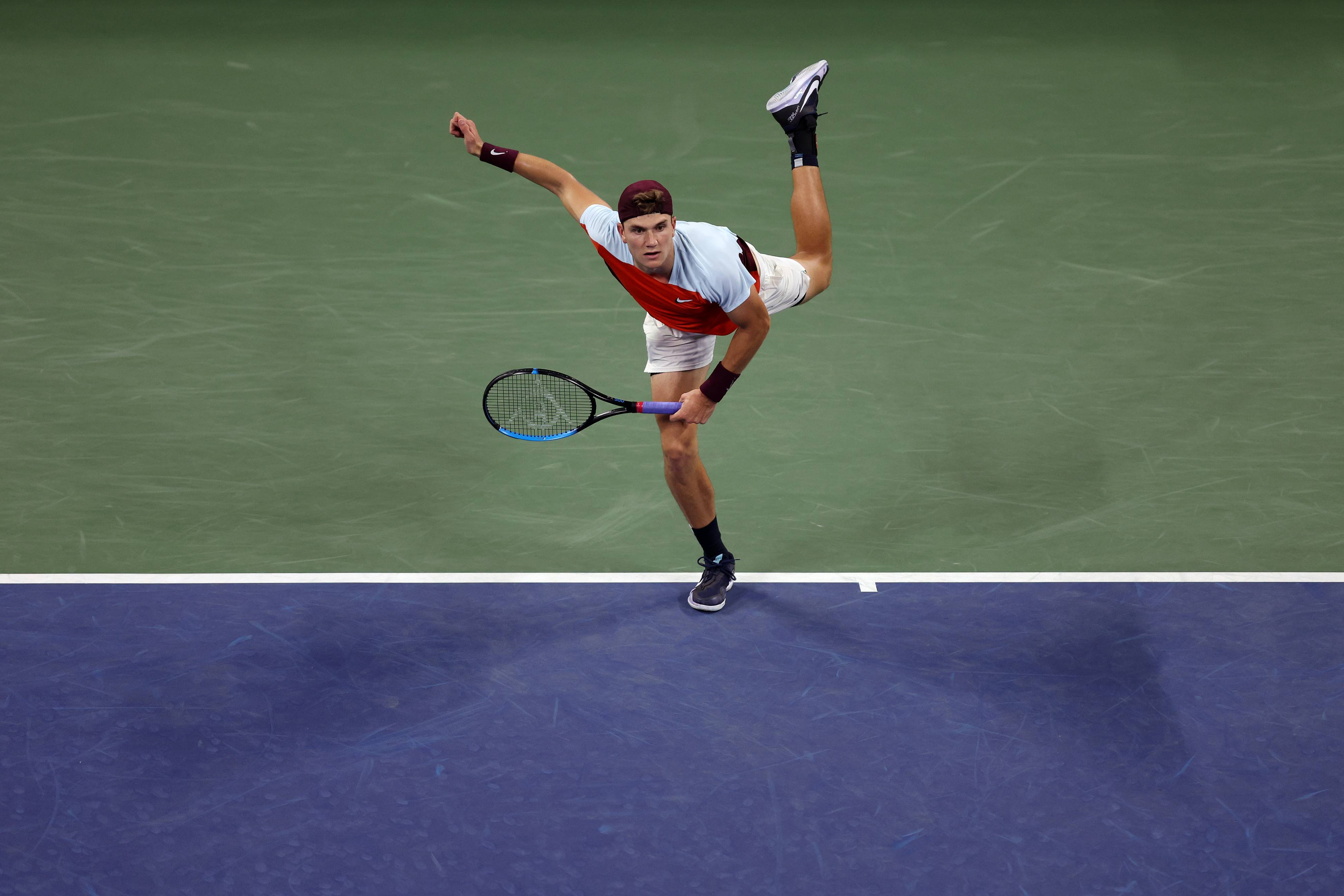 Jack Draper hits a serve in his victory over sixth seed Felix Auger-Aliassime at the US Open