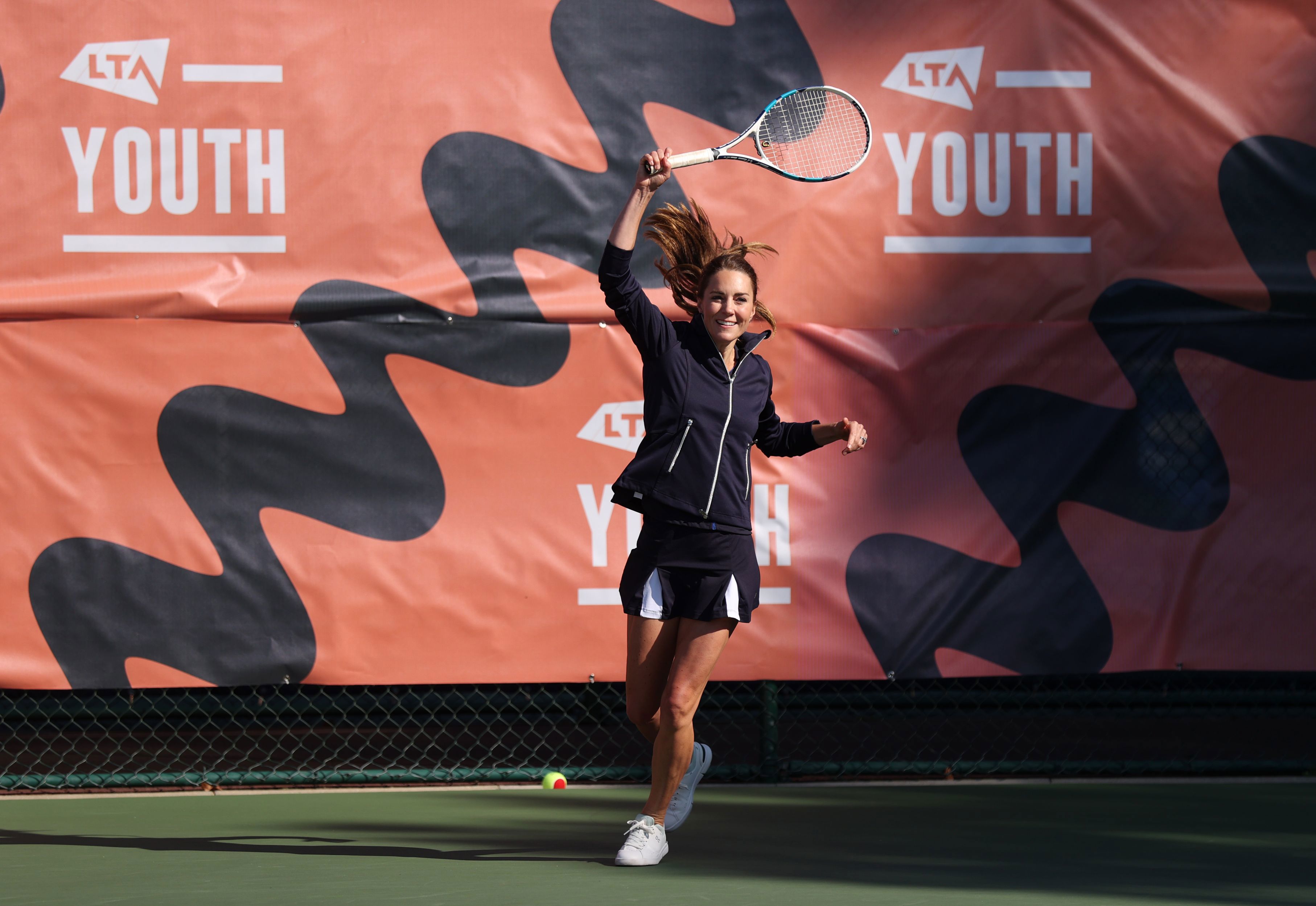 Duchess of Cambridge playing a forehand at an LTA Youth tennis session