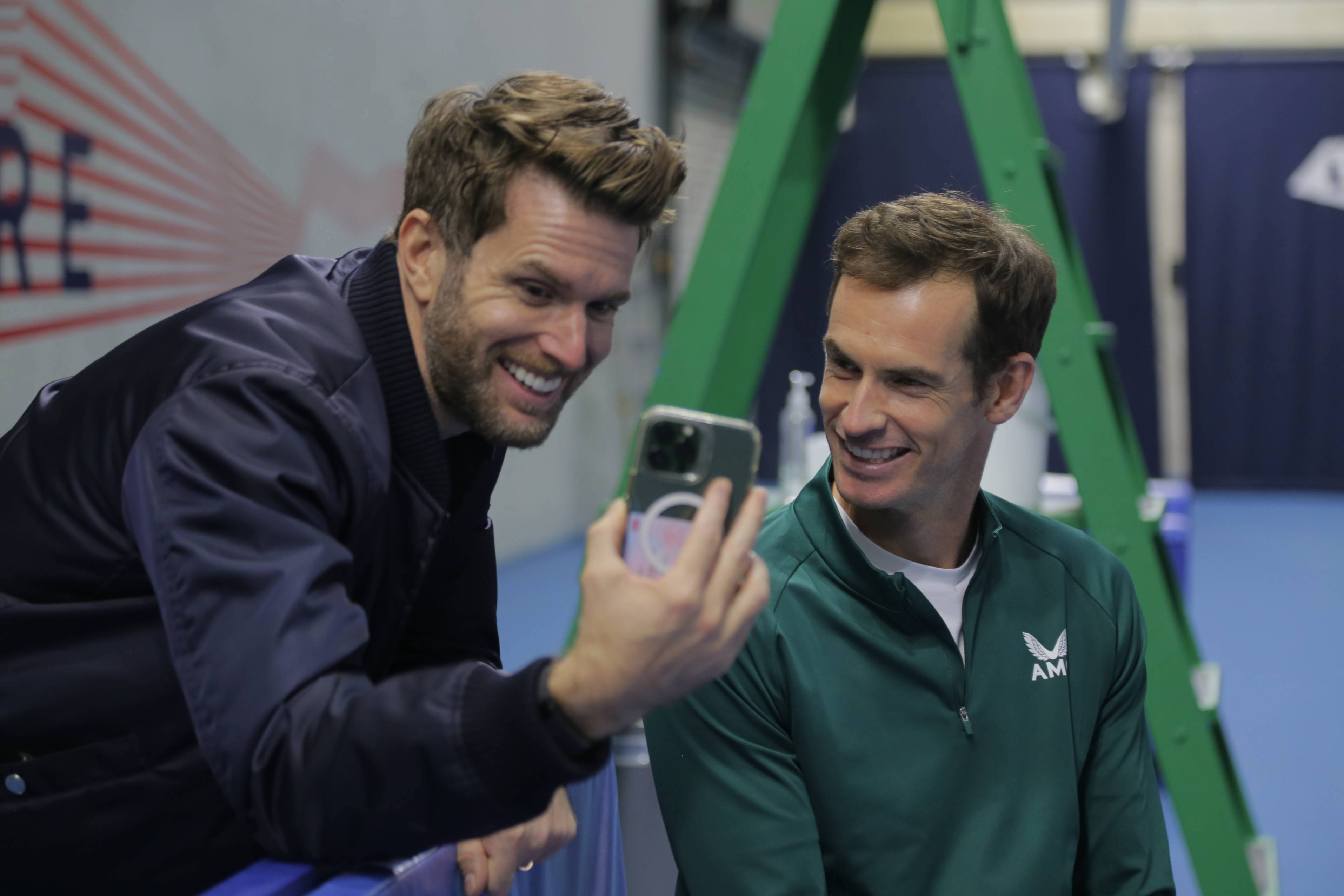 Joel Dommett andAndy Murray laughing on a video call