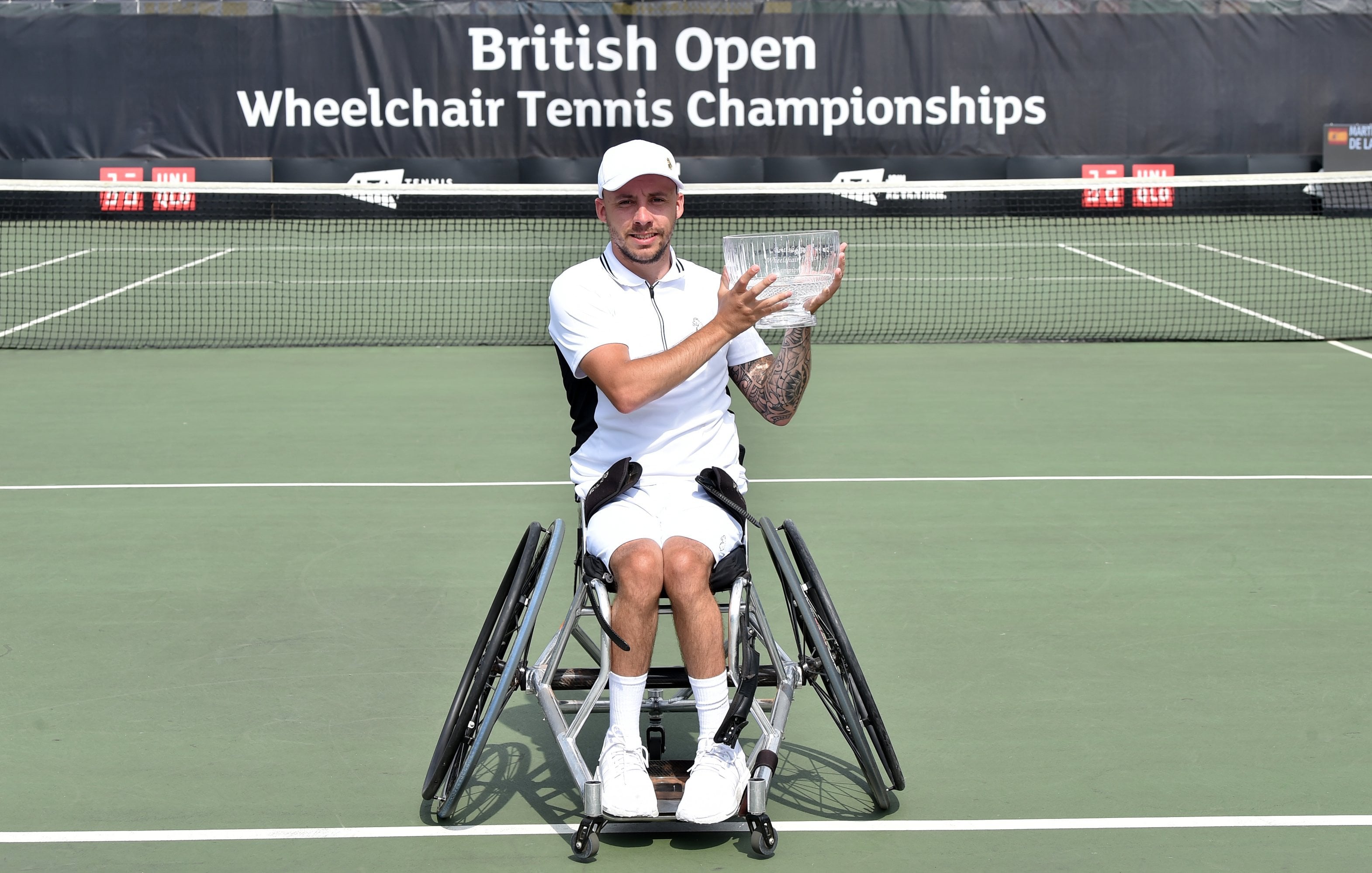 Andy Lapthorne poses with the trophy after being crowned the 2022 champion of the British Open quad singles event