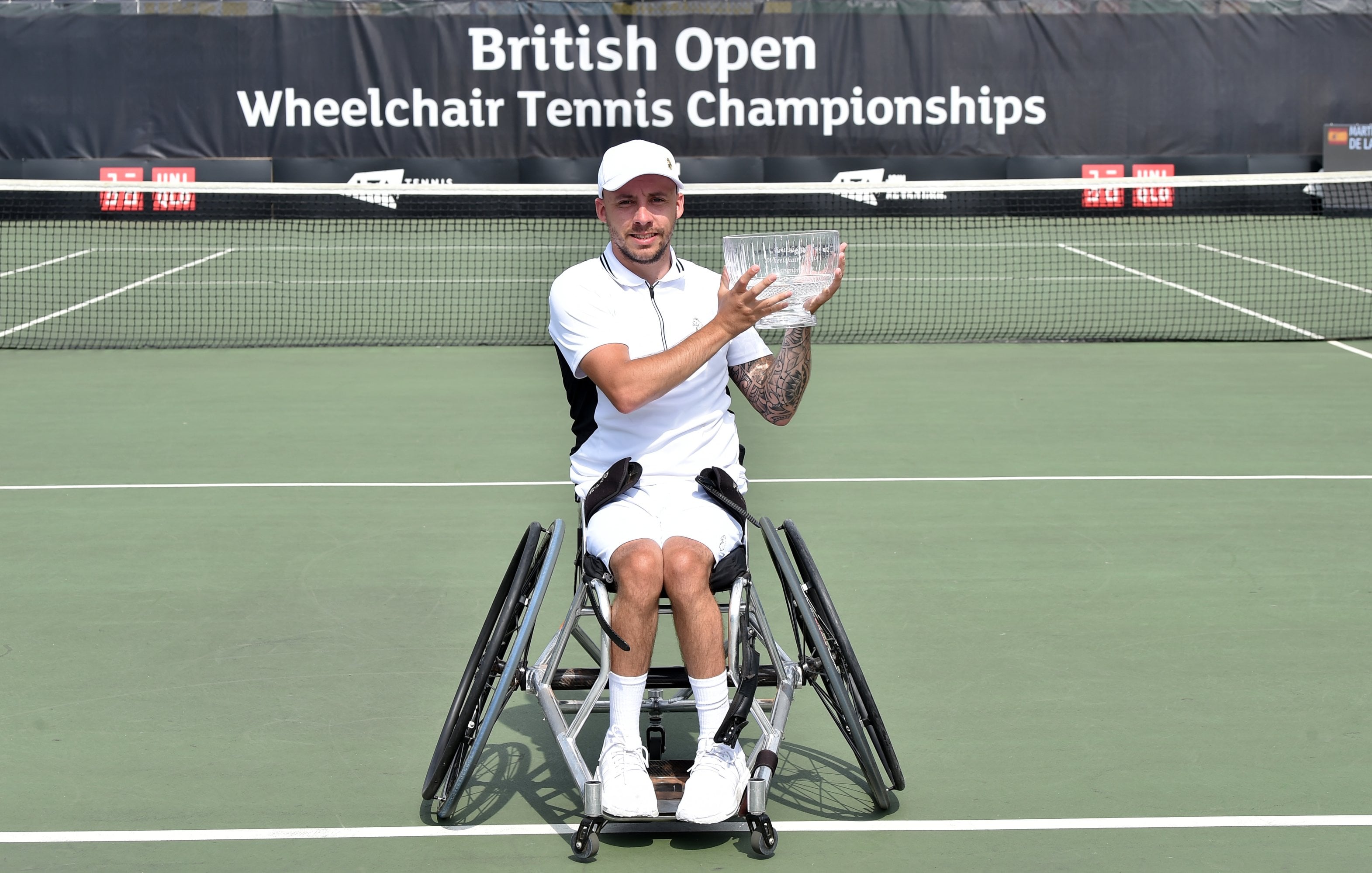 Andy Lapthorne poses with the trophy after being crowned the 2022 champion of the British Open quad singles event