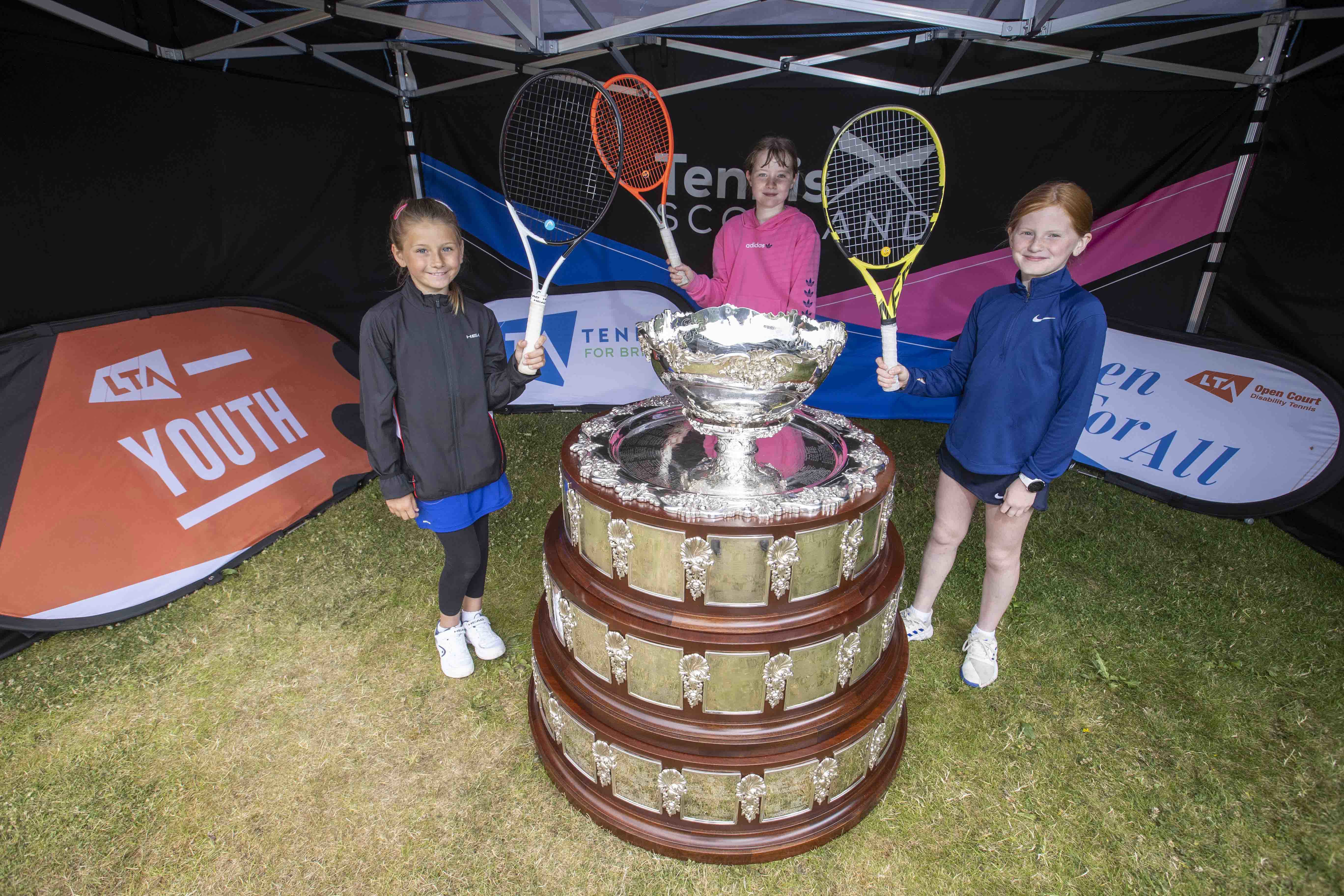 Craiglockhart tennis players with the Davis Cup trophy