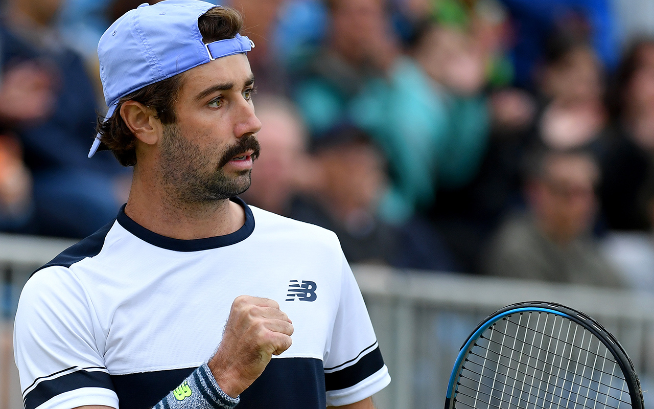 Jordan Thompson celebrates winning a point at the 2022 Surbiton Trophy