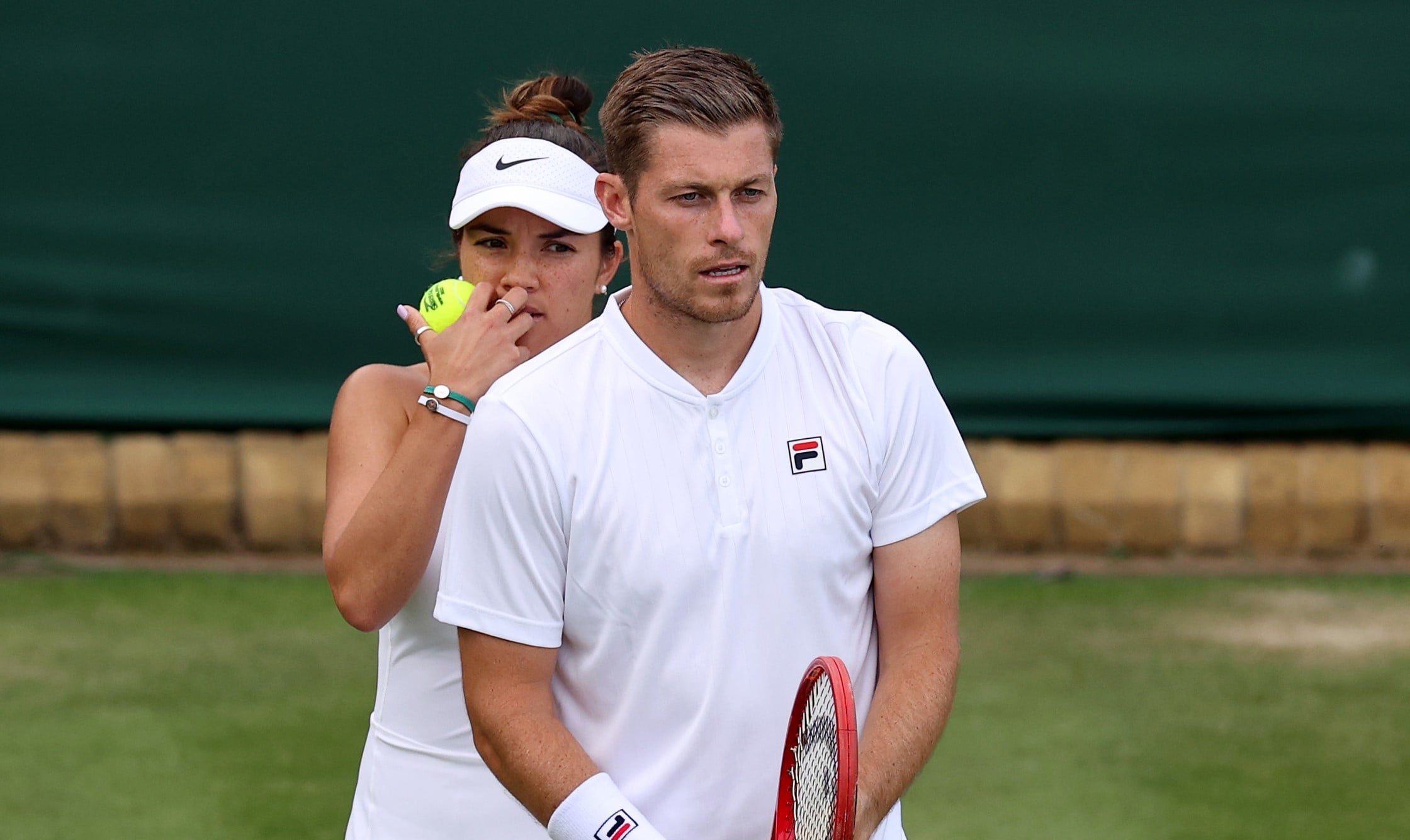 Neal Skupski and Desirae Krawczyk during their Mixed Doubles First Round match on day six of The Championships Wimbledon 2022 
