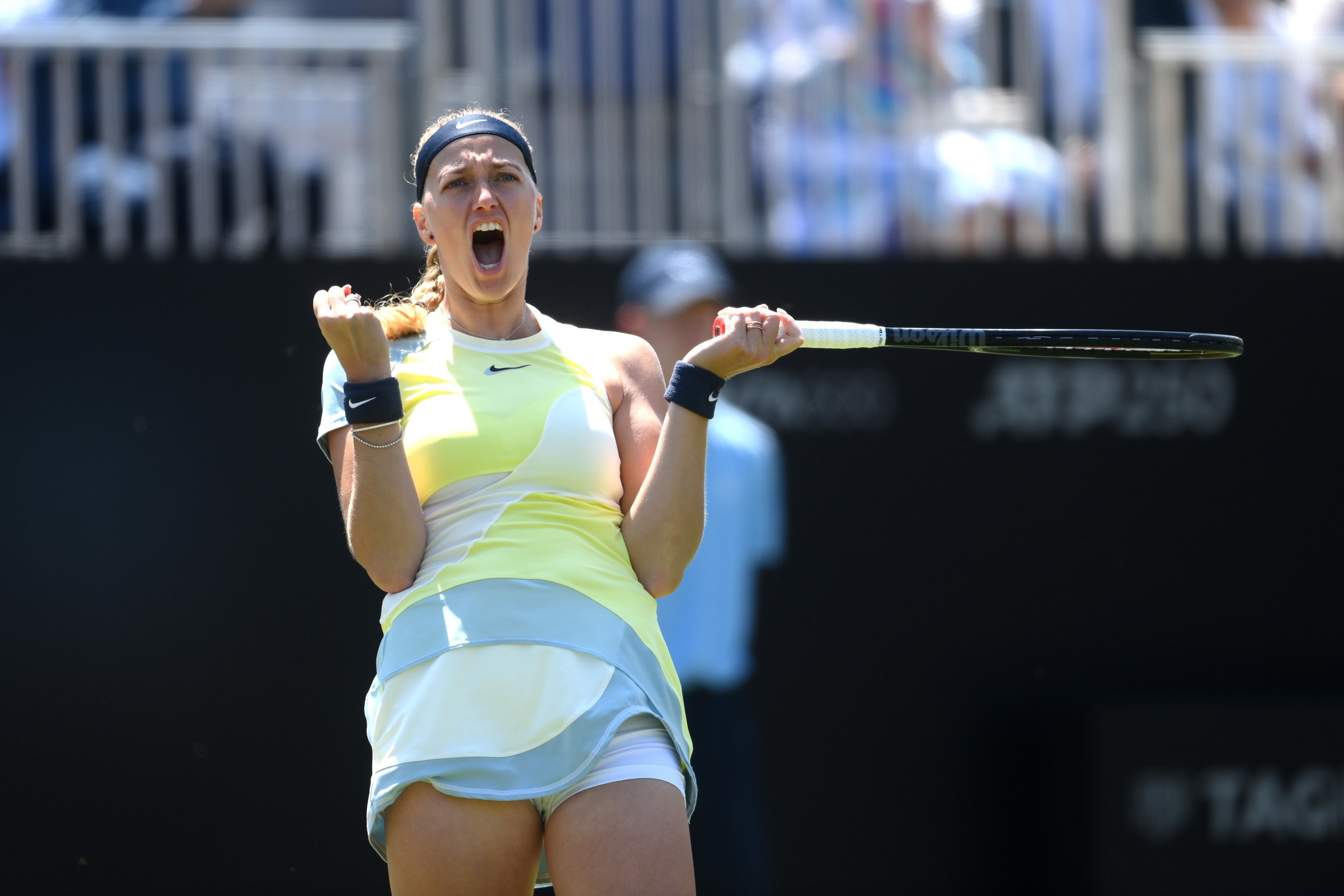 Petra Kvitova celebrating after winning match point against Beatriz Haddad Maia in the semi-finals of the Rothesay International Eastbourne