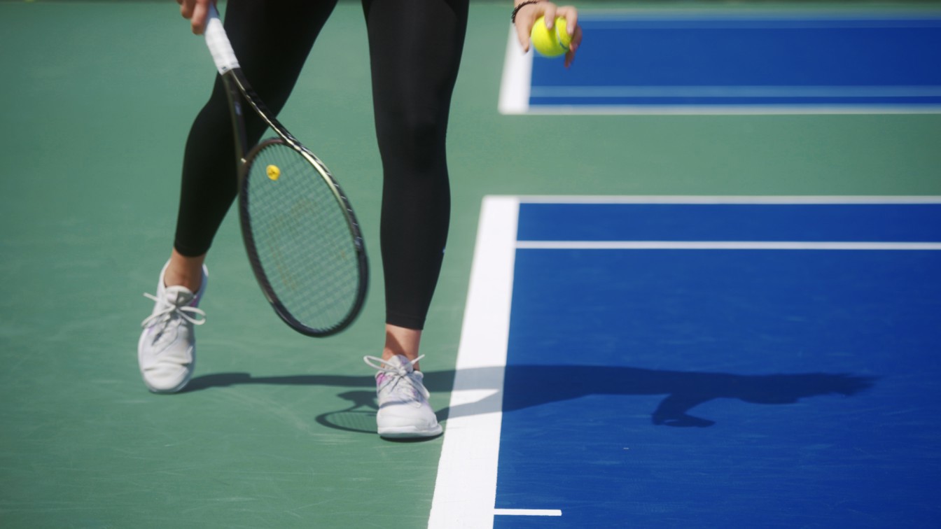 General shot of a player serving