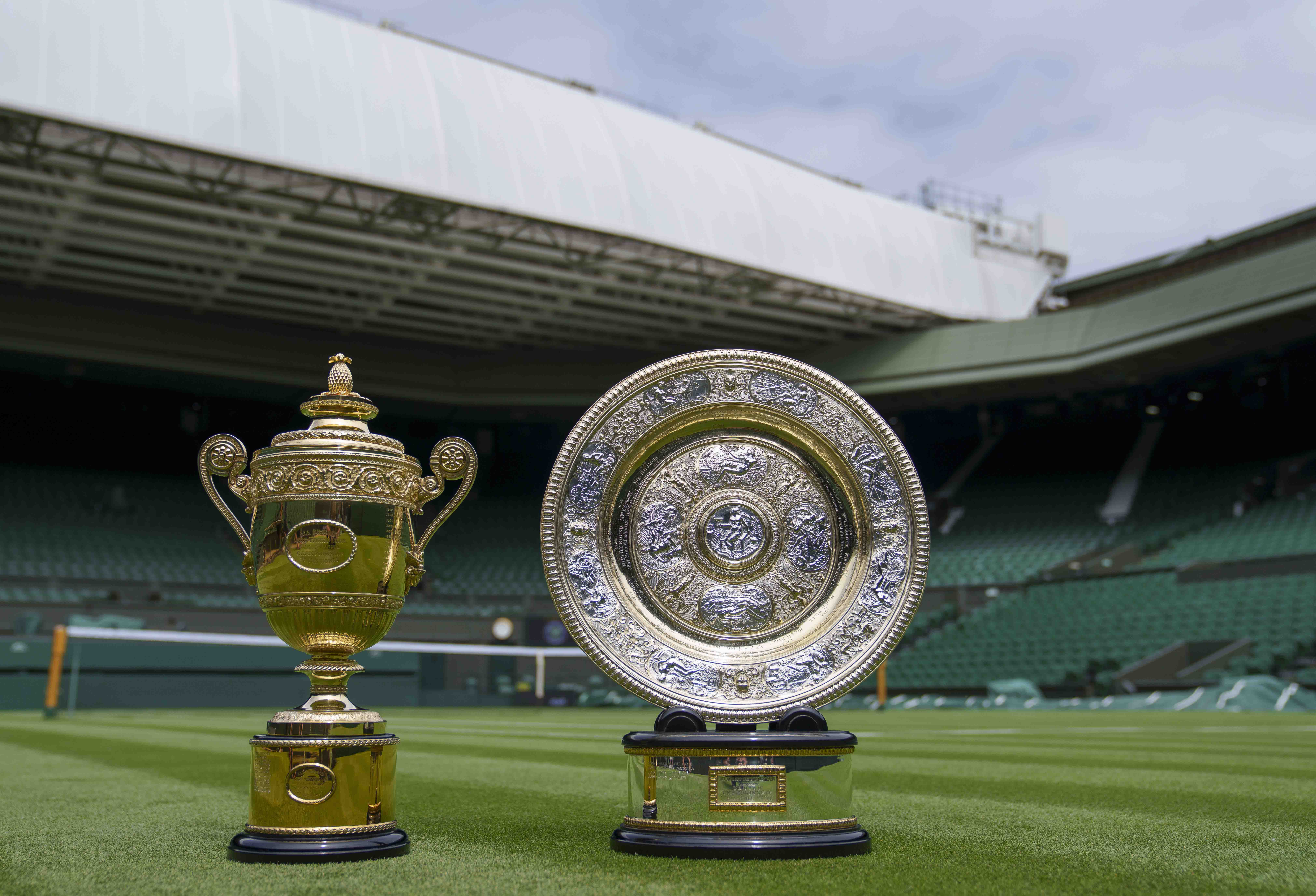 The men's singles and women's singles Wimbledon trophies